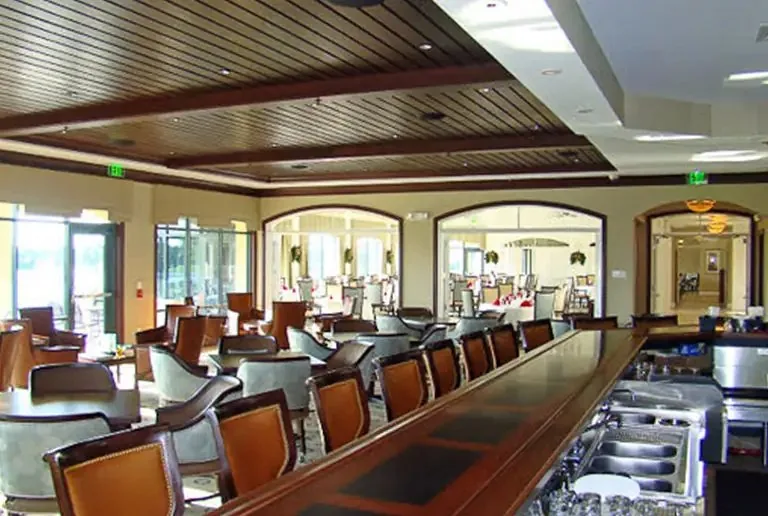 Commercial bar cabinetry and wood paneled ceiling by Pohl Custom Cabinets