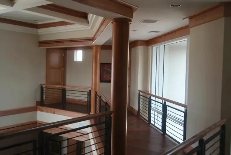 Custom trim, columns and railing millwork by Pohl Custom Cabinets