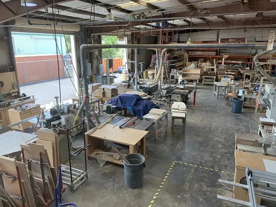 Assembly bays and material racks inside the Pohl shop